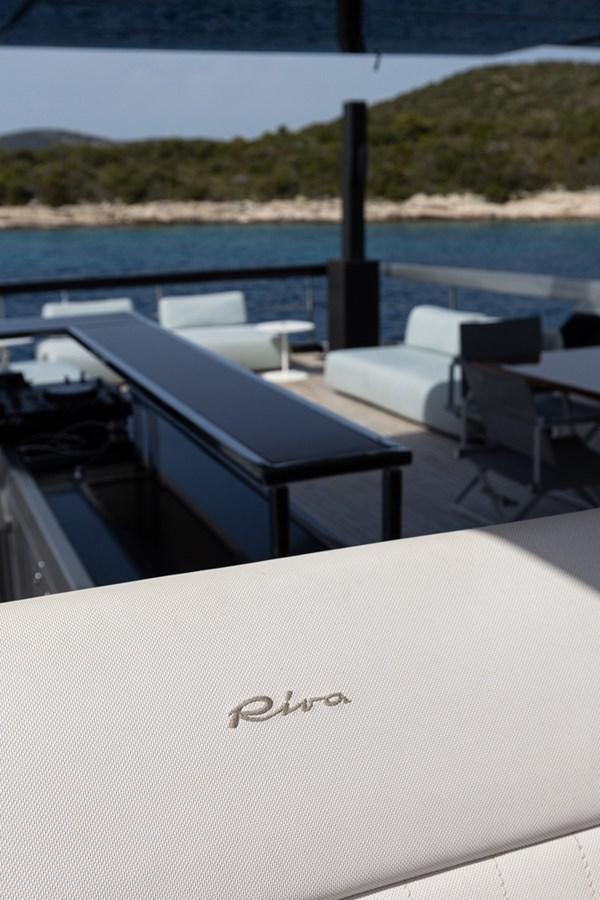 a pool with chairs and tables aboard NO STRESS 888 Yacht for Sale