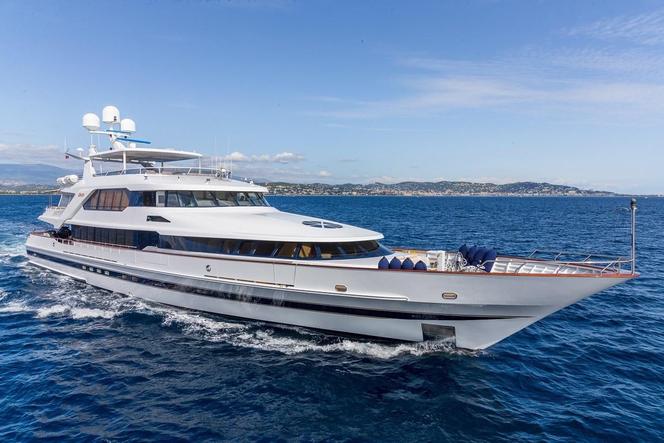 a large white boat in the water aboard LUCY III Yacht for Sale