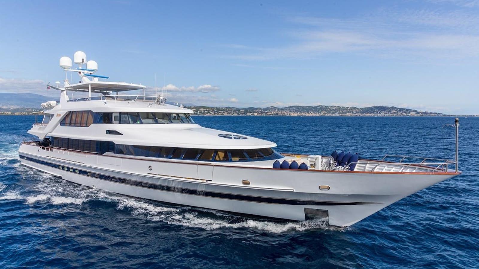 a large white boat in the water aboard LUCY III Yacht for Sale
