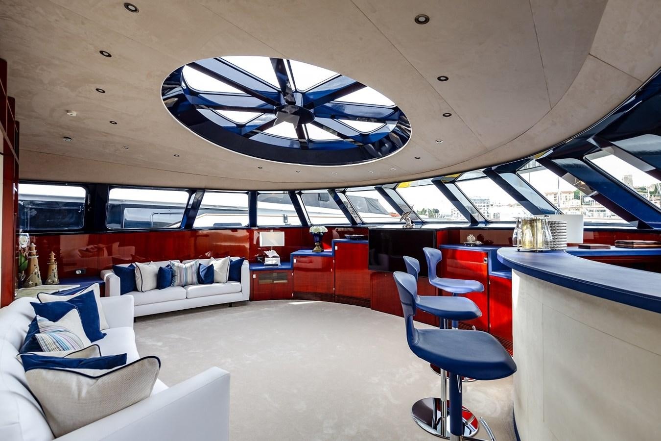 a room with chairs and a table aboard LUCY III Yacht for Sale