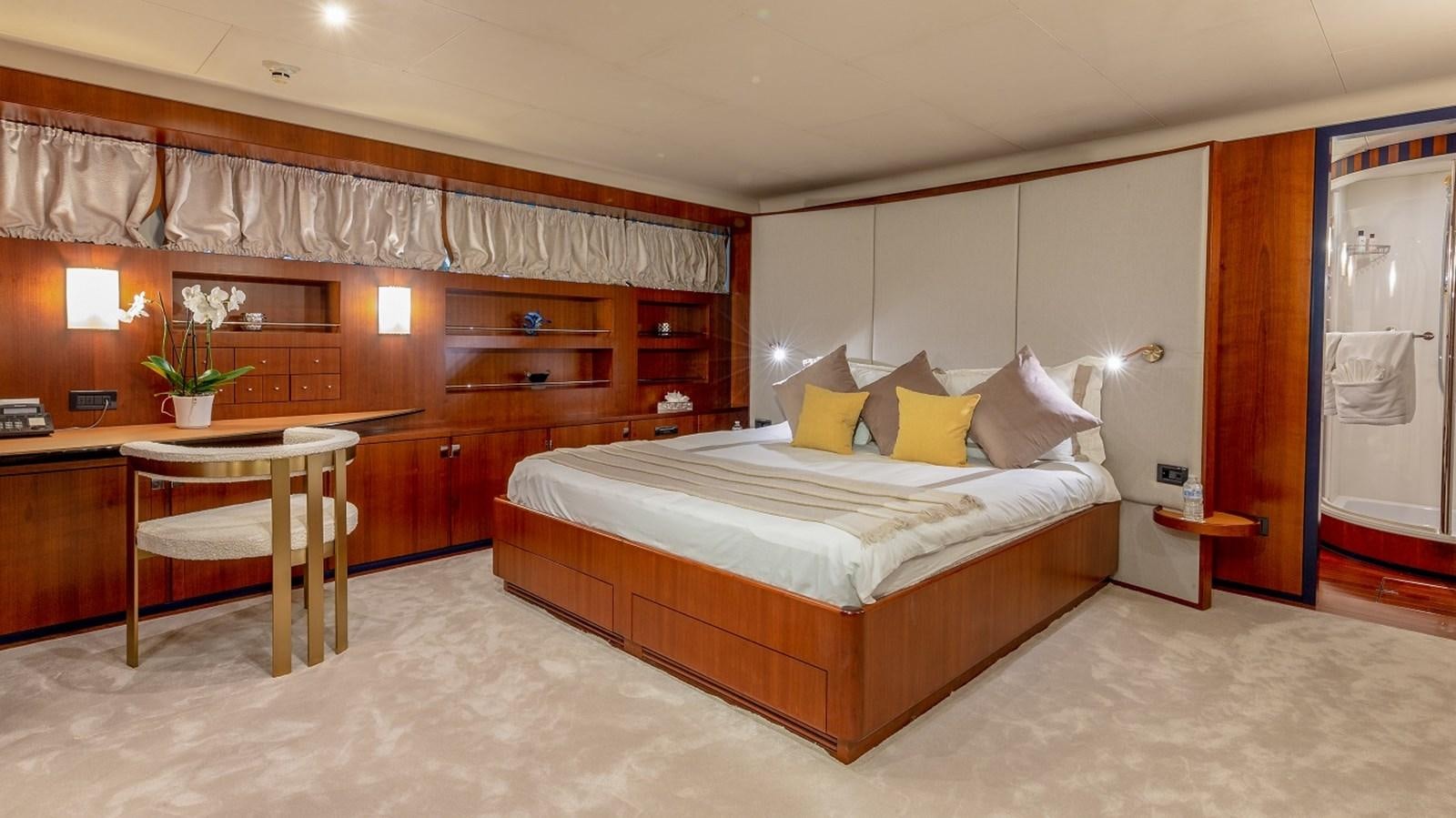 a bed in a room aboard LUCY III Yacht for Sale