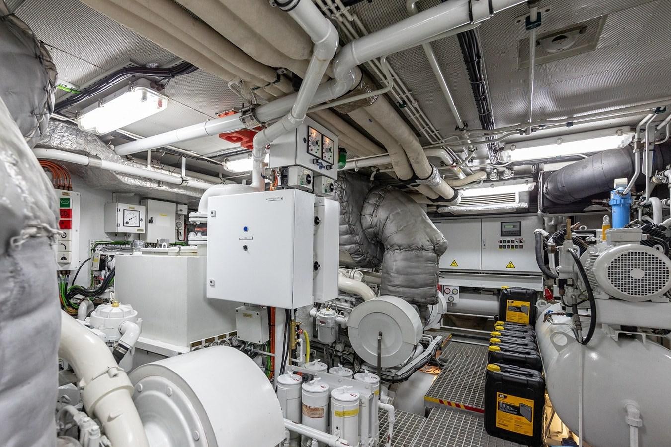 a large room with machinery aboard LUCY III Yacht for Sale