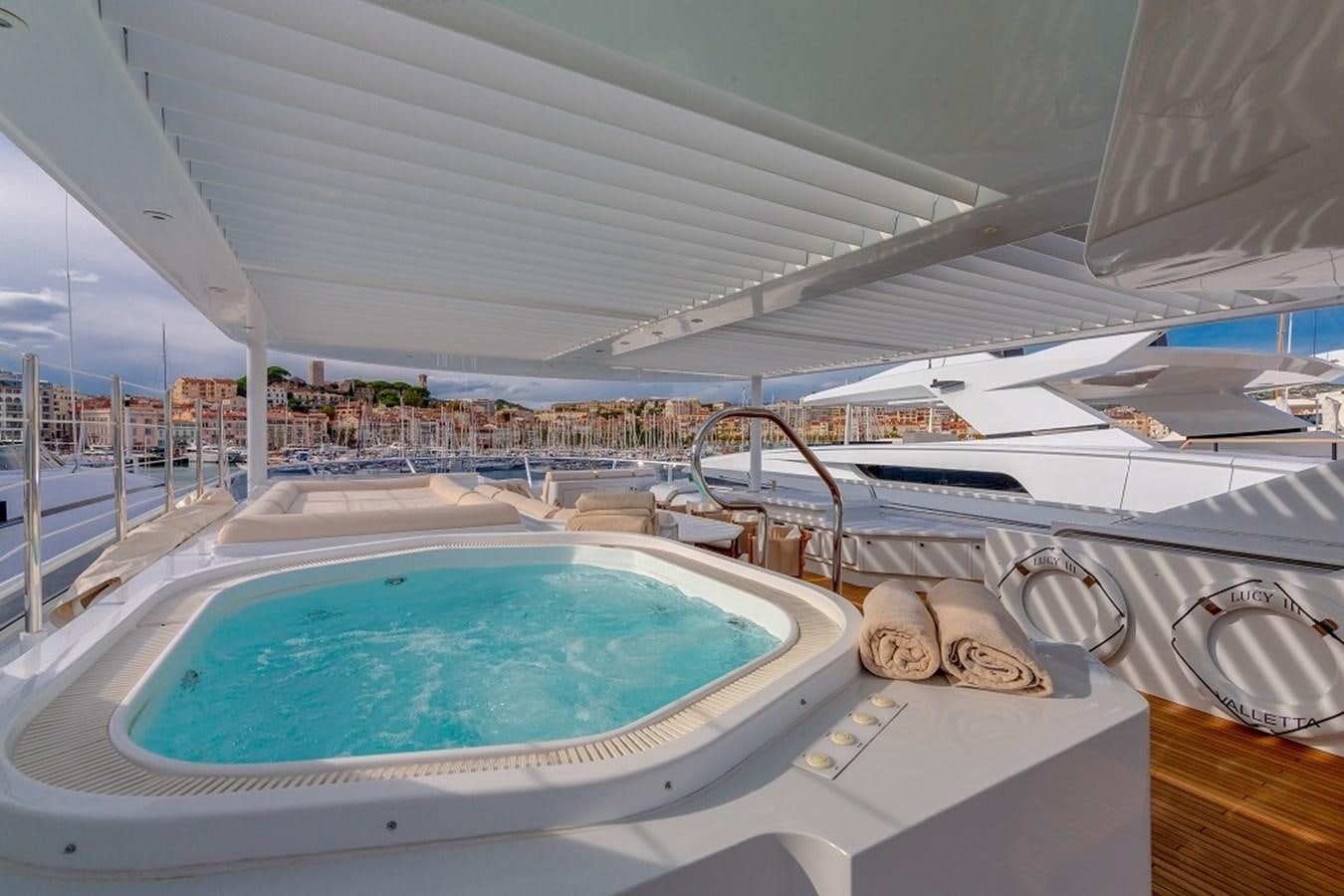 a large indoor swimming pool aboard LUCY III Yacht for Sale