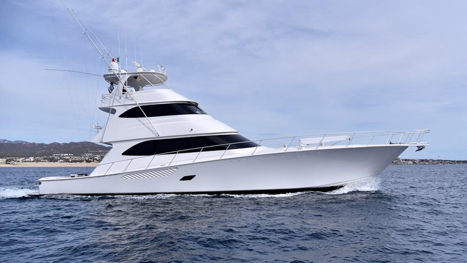 a white yacht in the water aboard SALTY K Yacht for Sale