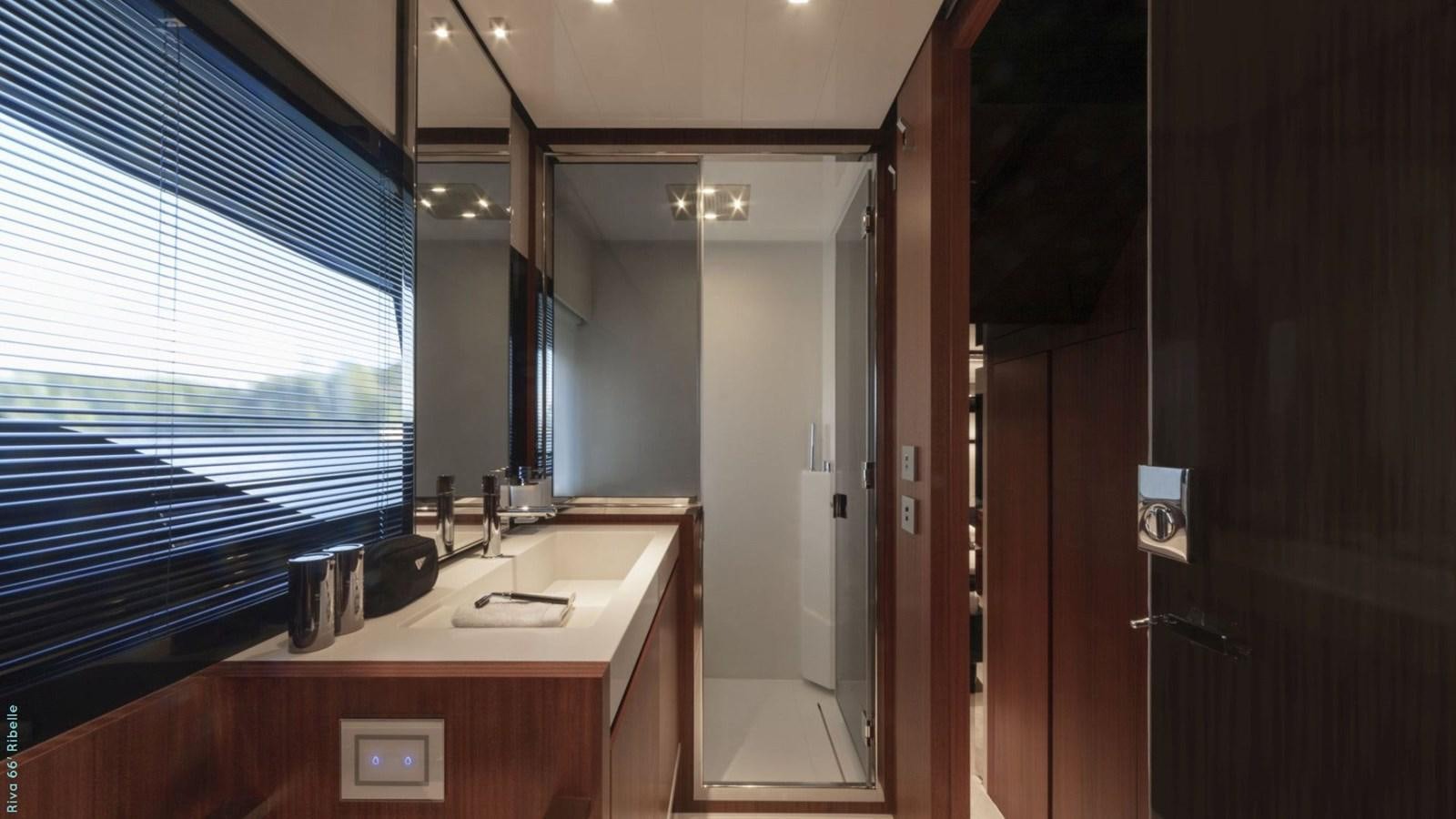 a bathroom with a sink and a mirror aboard N1 Yacht for Sale
