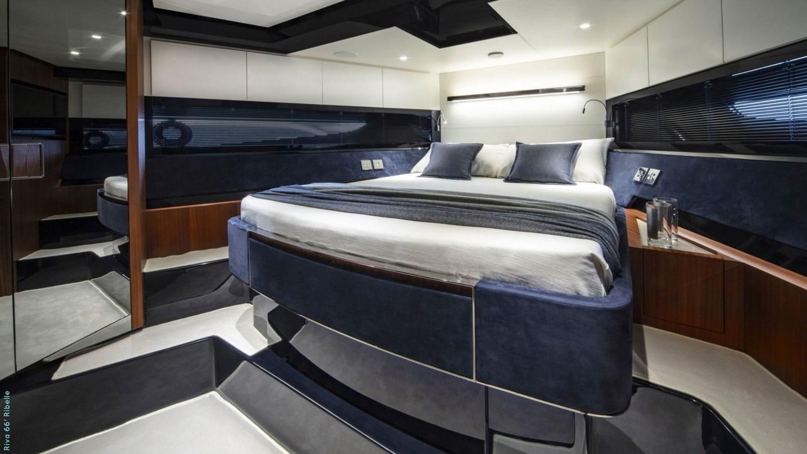 a bed in a room aboard N1 Yacht for Sale