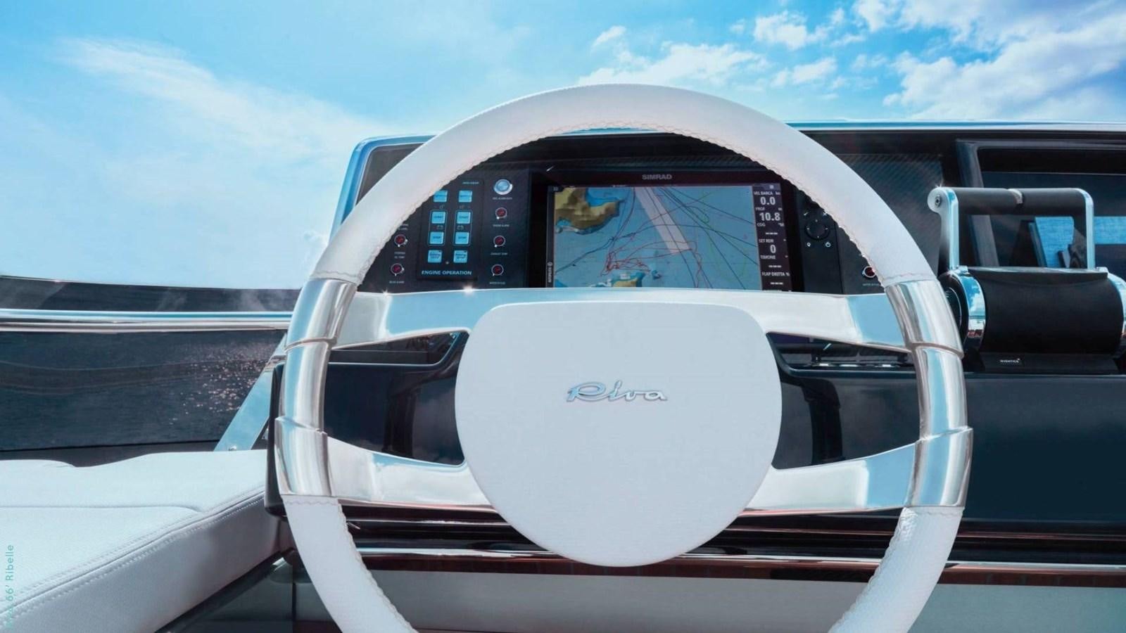 the front of a white car aboard N1 Yacht for Sale