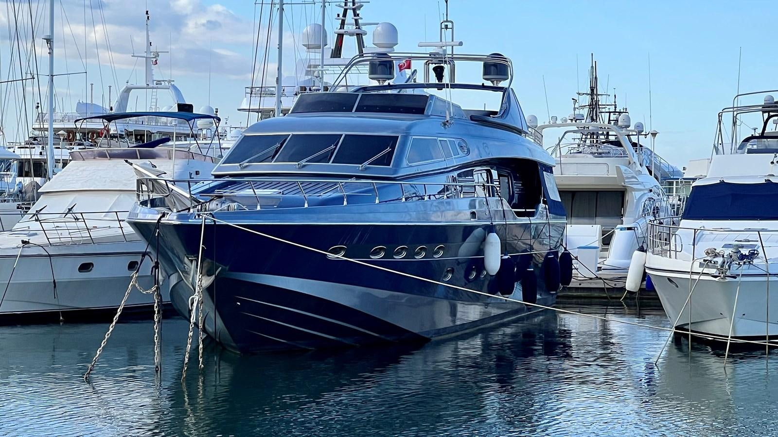 a group of boats in a harbor aboard AZUR LE ROI Yacht for Sale