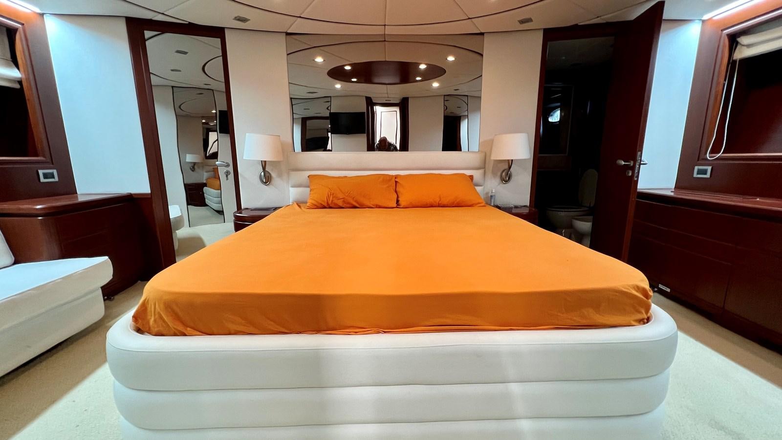 a bed in a hotel room aboard AZUR LE ROI Yacht for Sale