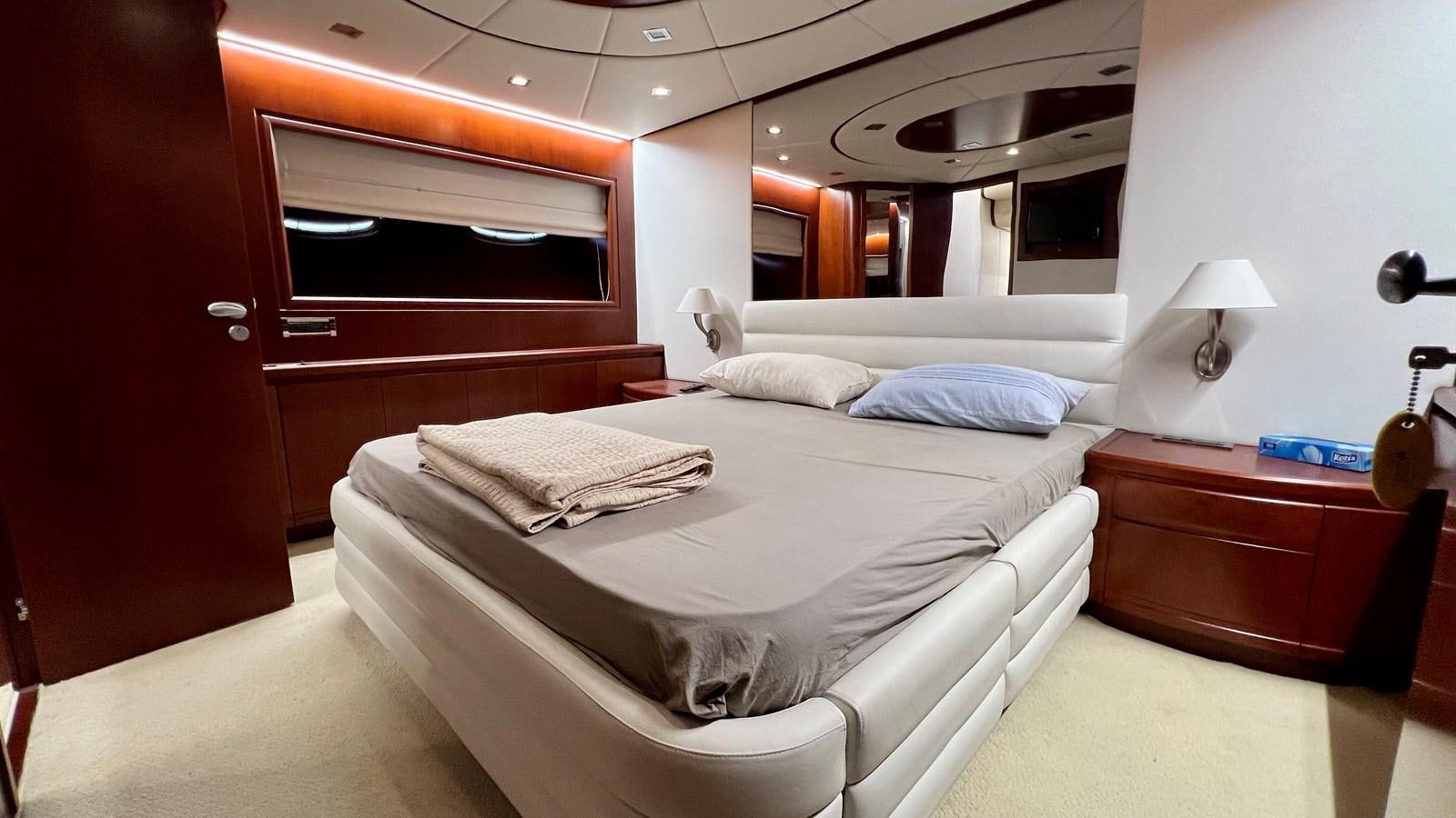 a room with two beds aboard AZUR LE ROI Yacht for Sale
