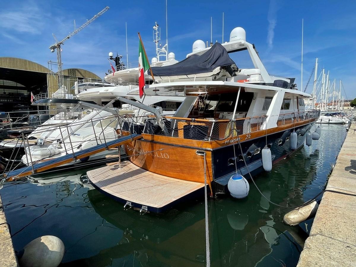 a boat docked at a pier aboard QUADRIFOGLIO Yacht for Sale