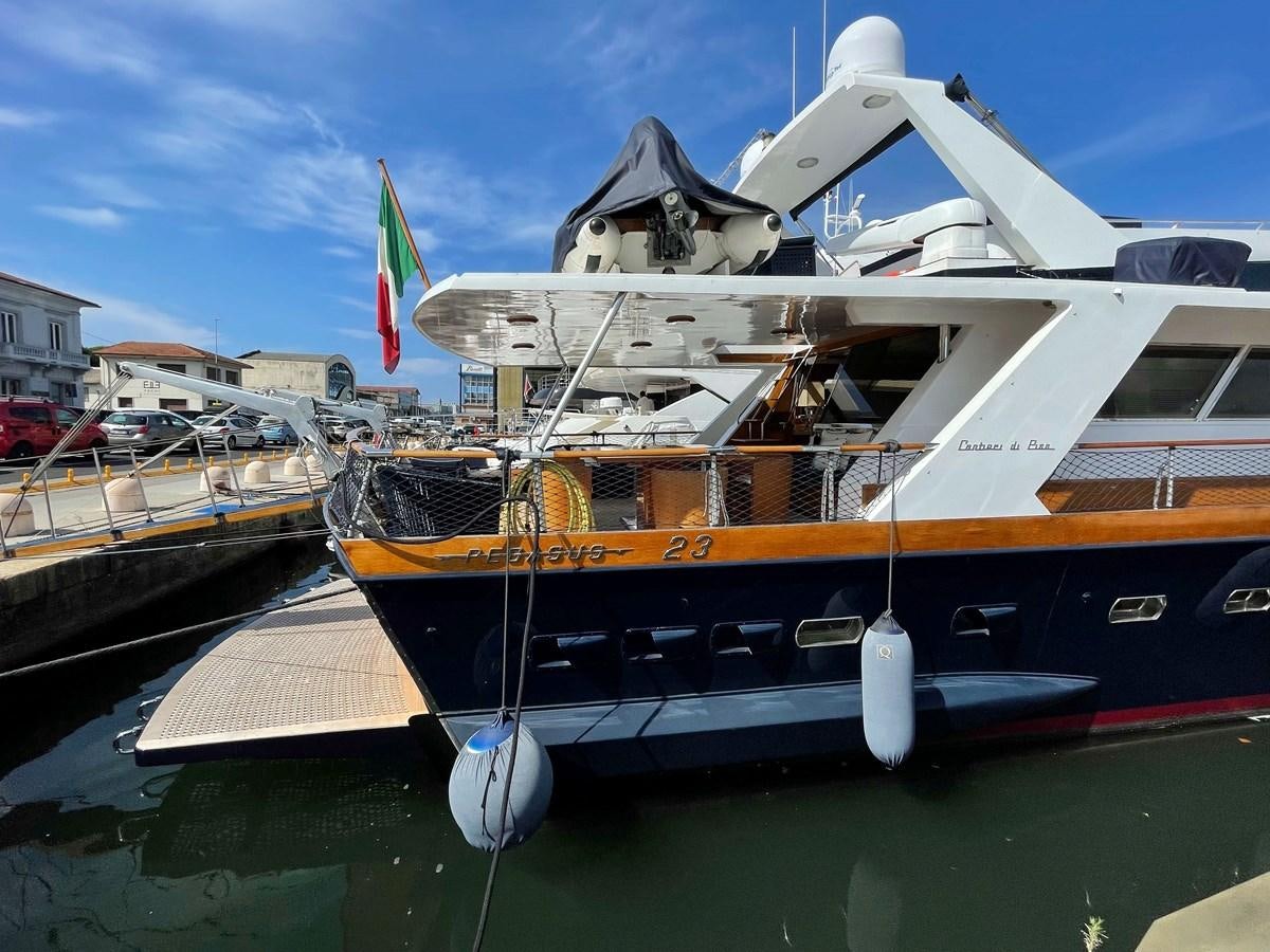 a large boat docked at a pier aboard QUADRIFOGLIO Yacht for Sale