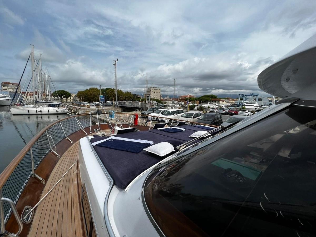 a group of boats are parked in a harbor aboard QUADRIFOGLIO Yacht for Sale