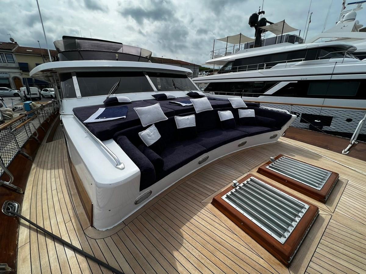 a deck with a deck and a boat on it aboard QUADRIFOGLIO Yacht for Sale