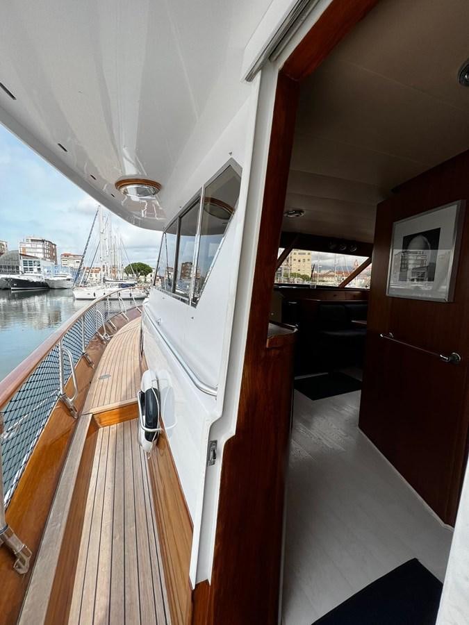 a boat on a deck aboard QUADRIFOGLIO Yacht for Sale