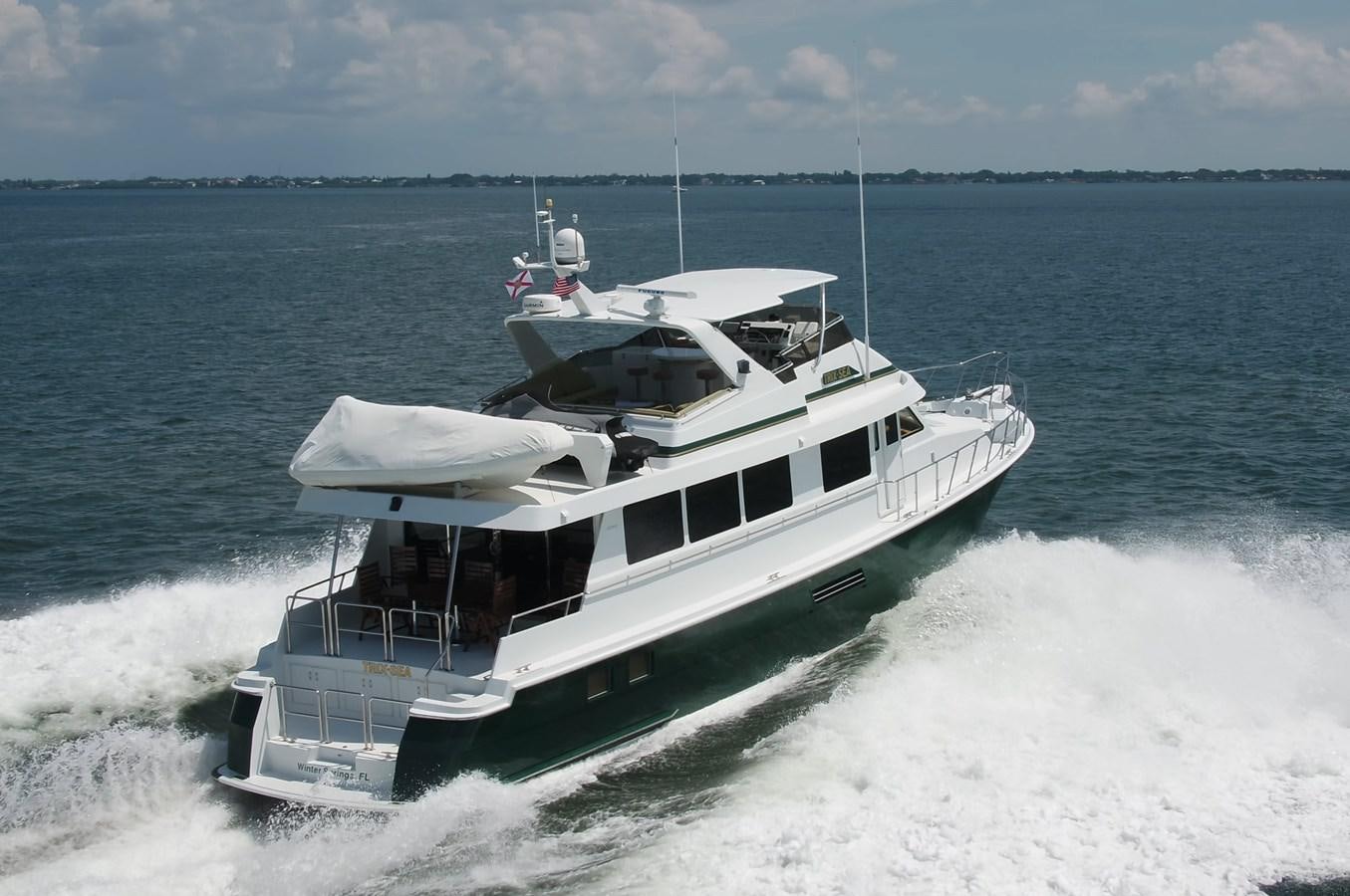 a boat on the water aboard BOOGIE BABE III Yacht for Sale