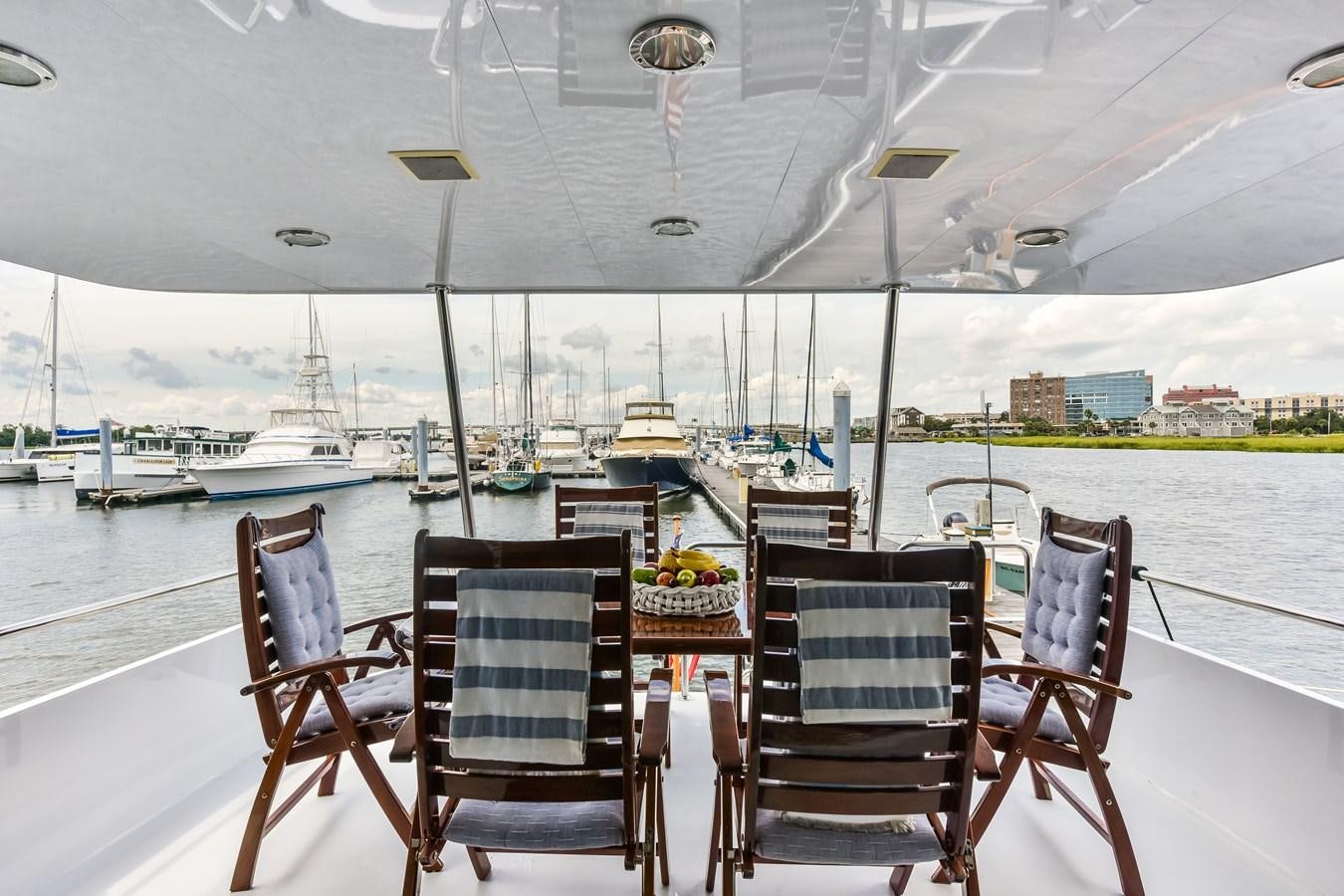 a group of chairs on a deck aboard BOOGIE BABE III Yacht for Sale