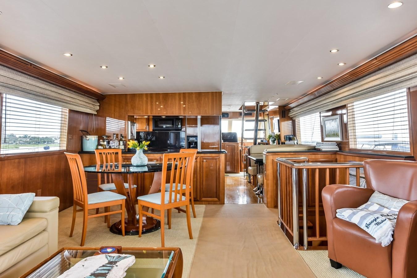 a kitchen and living room aboard BOOGIE BABE III Yacht for Sale