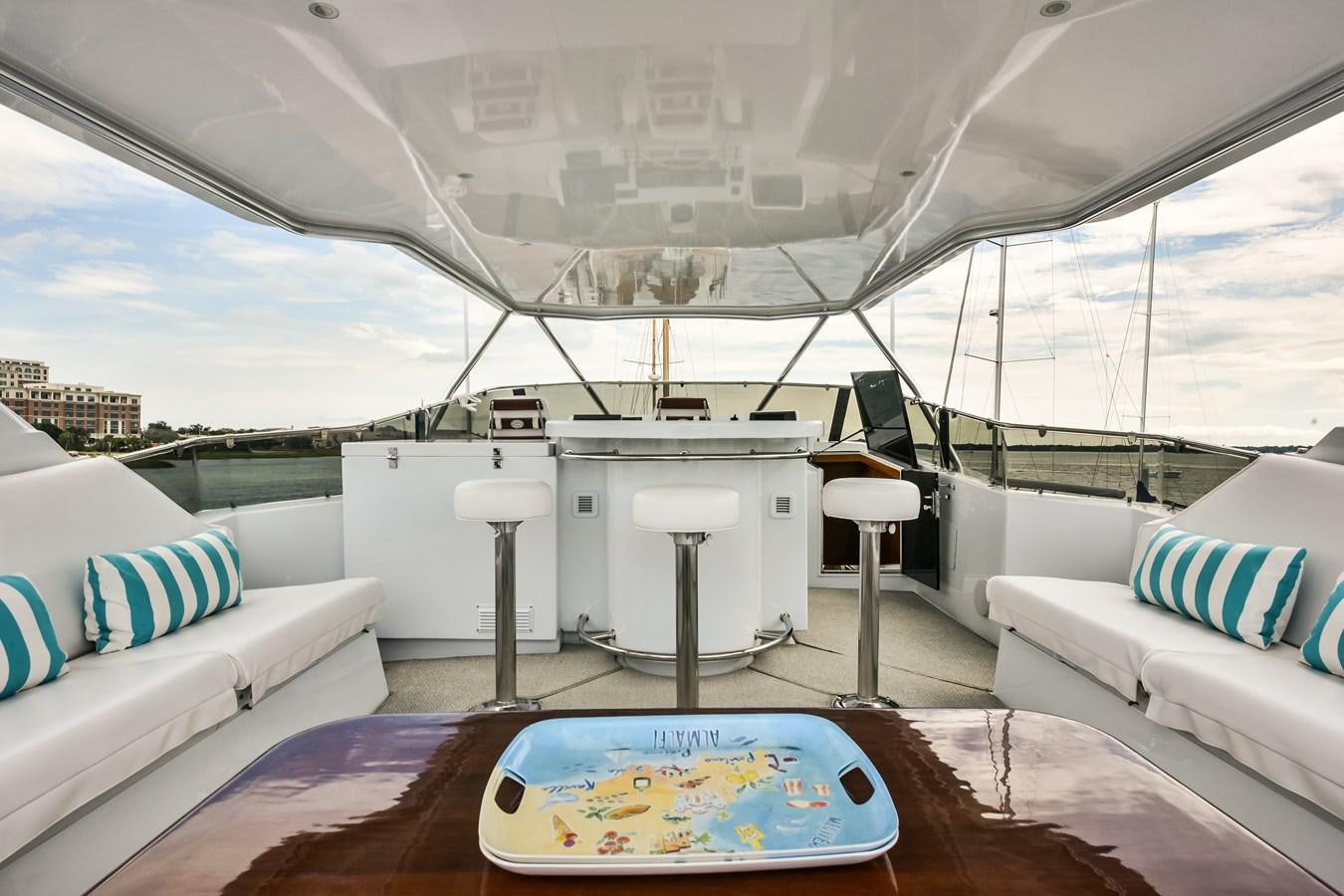 a large white tent with a table and chairs aboard BOOGIE BABE III Yacht for Sale