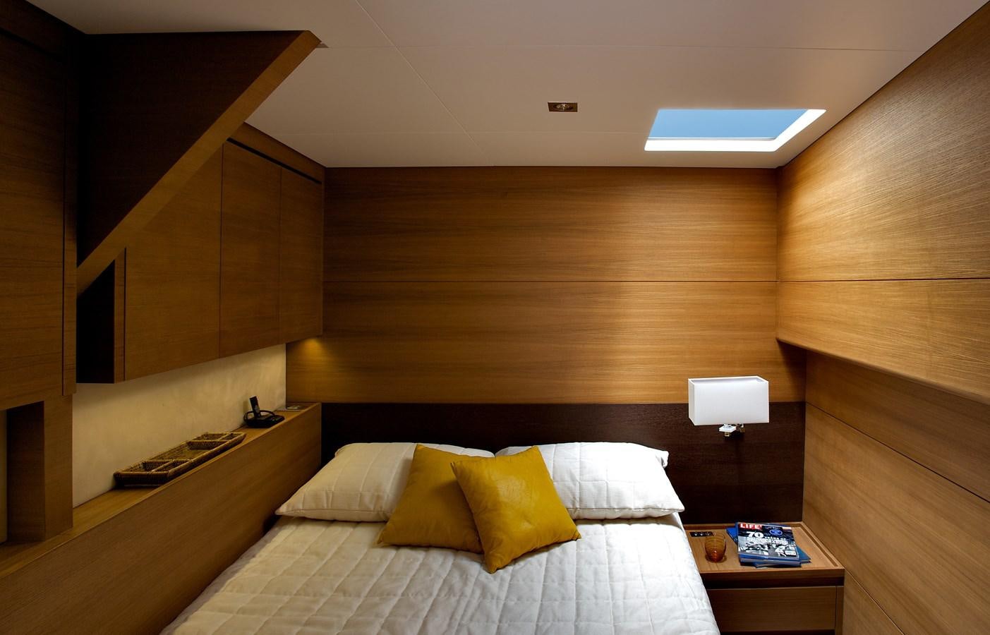 a bed with pillows aboard INDIO Yacht for Sale