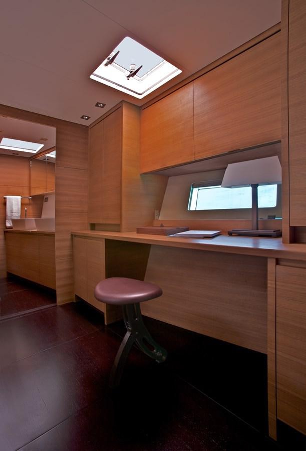 a desk with a computer aboard INDIO Yacht for Sale