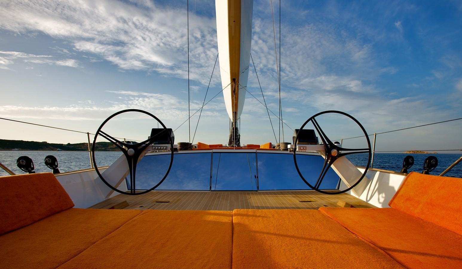 a boat with a steering wheel aboard INDIO Yacht for Sale