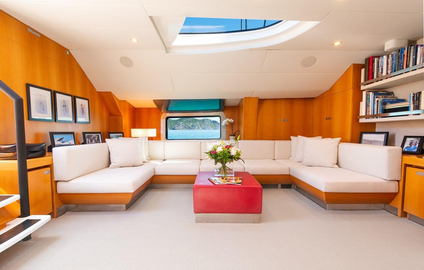 a living room with a couch and a table aboard SILVERTIP Yacht for Sale