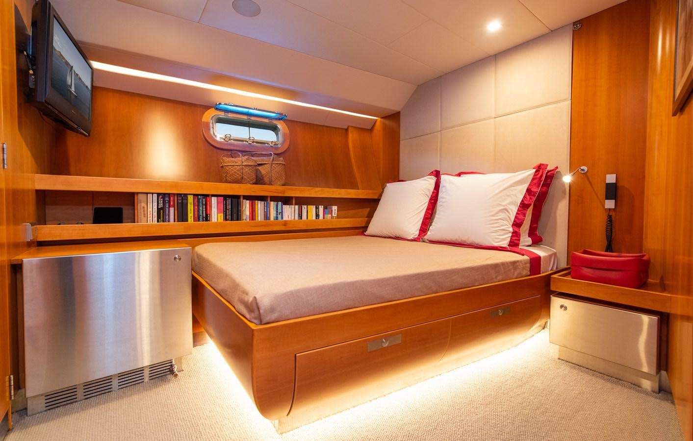 a bed in a room aboard SILVERTIP Yacht for Sale