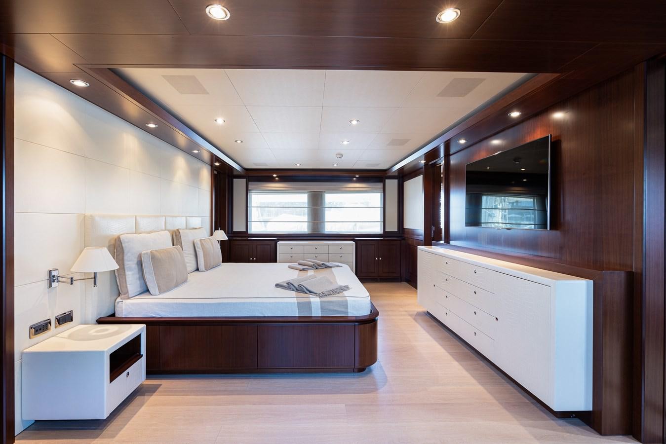 a large bedroom with a bed aboard ONLY EIGHTY Yacht for Sale