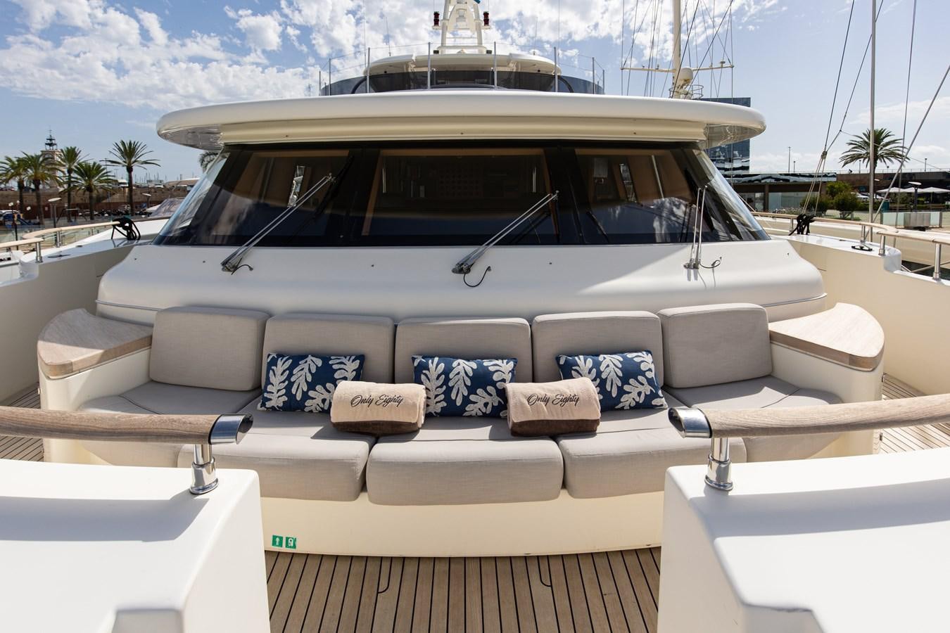 a boat with a bench on the deck aboard ONLY EIGHTY Yacht for Sale