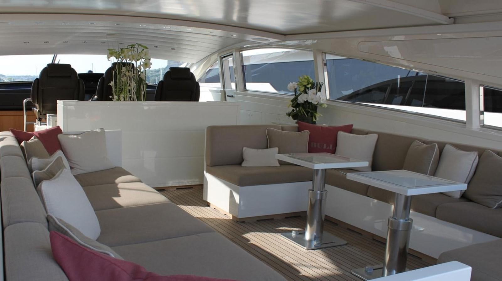 a living room with a couch and a table aboard MAZAG Yacht for Sale