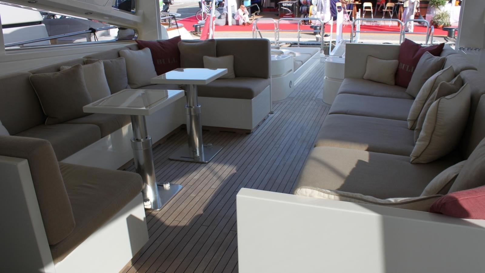 a room with couches and tables aboard MAZAG Yacht for Sale