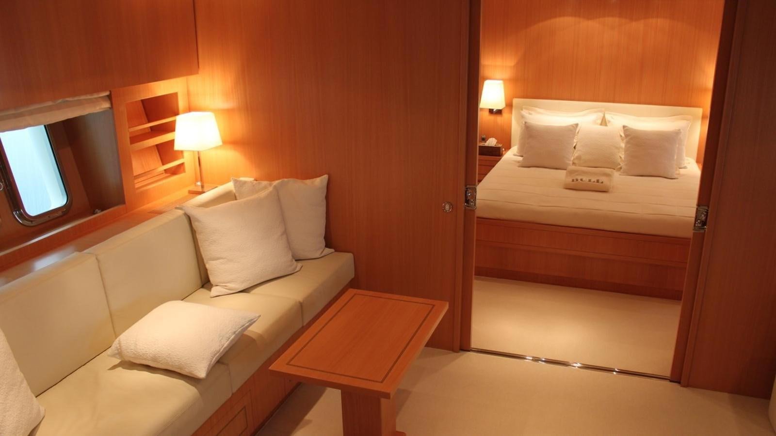 a hotel room with a bed and a table aboard MAZAG Yacht for Sale