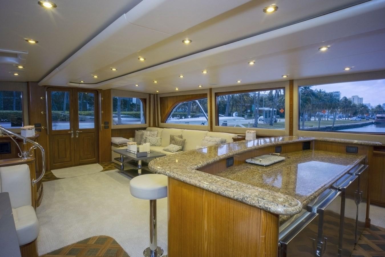 a large kitchen and living room aboard REEL DEAL Yacht for Sale