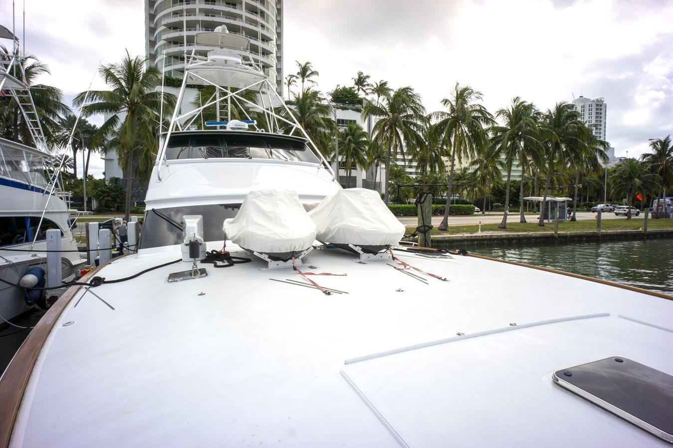 a group of boats on a body of water aboard REEL DEAL Yacht for Sale