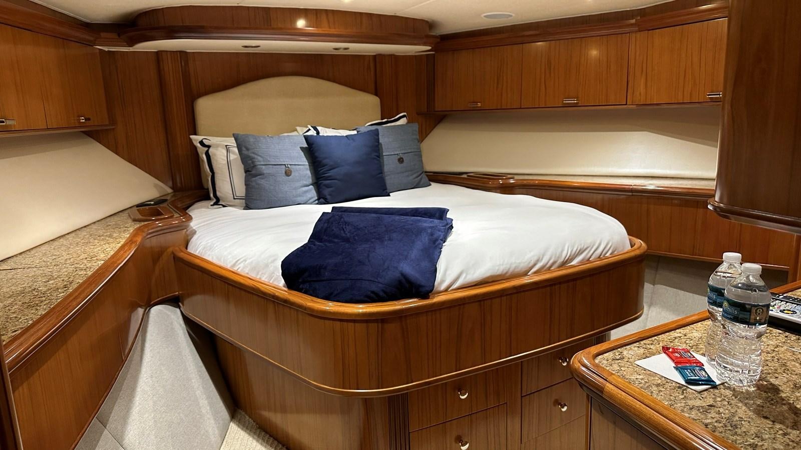 a bed in a room aboard REEL DEAL Yacht for Sale