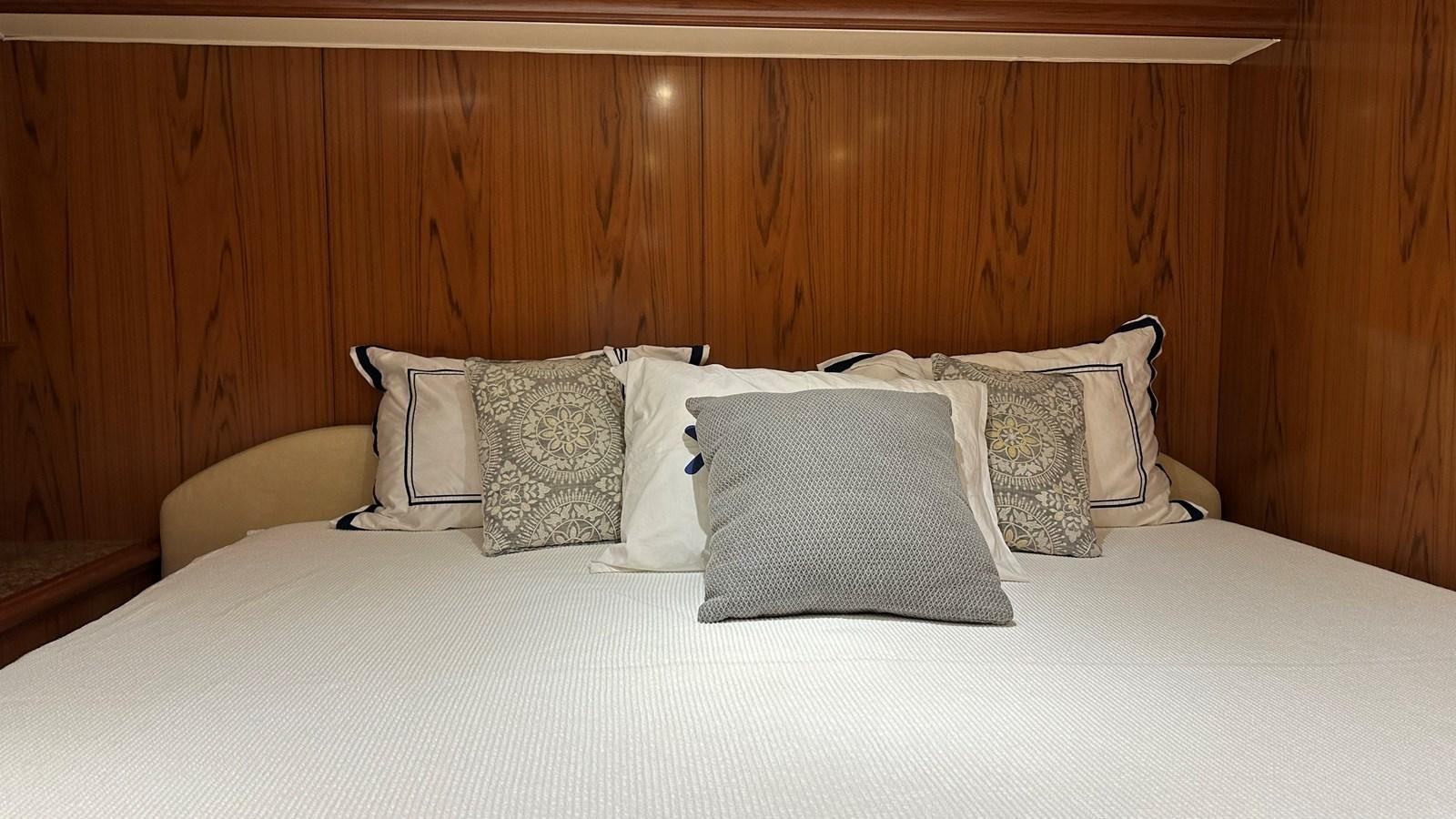pillows on a bed aboard REEL DEAL Yacht for Sale