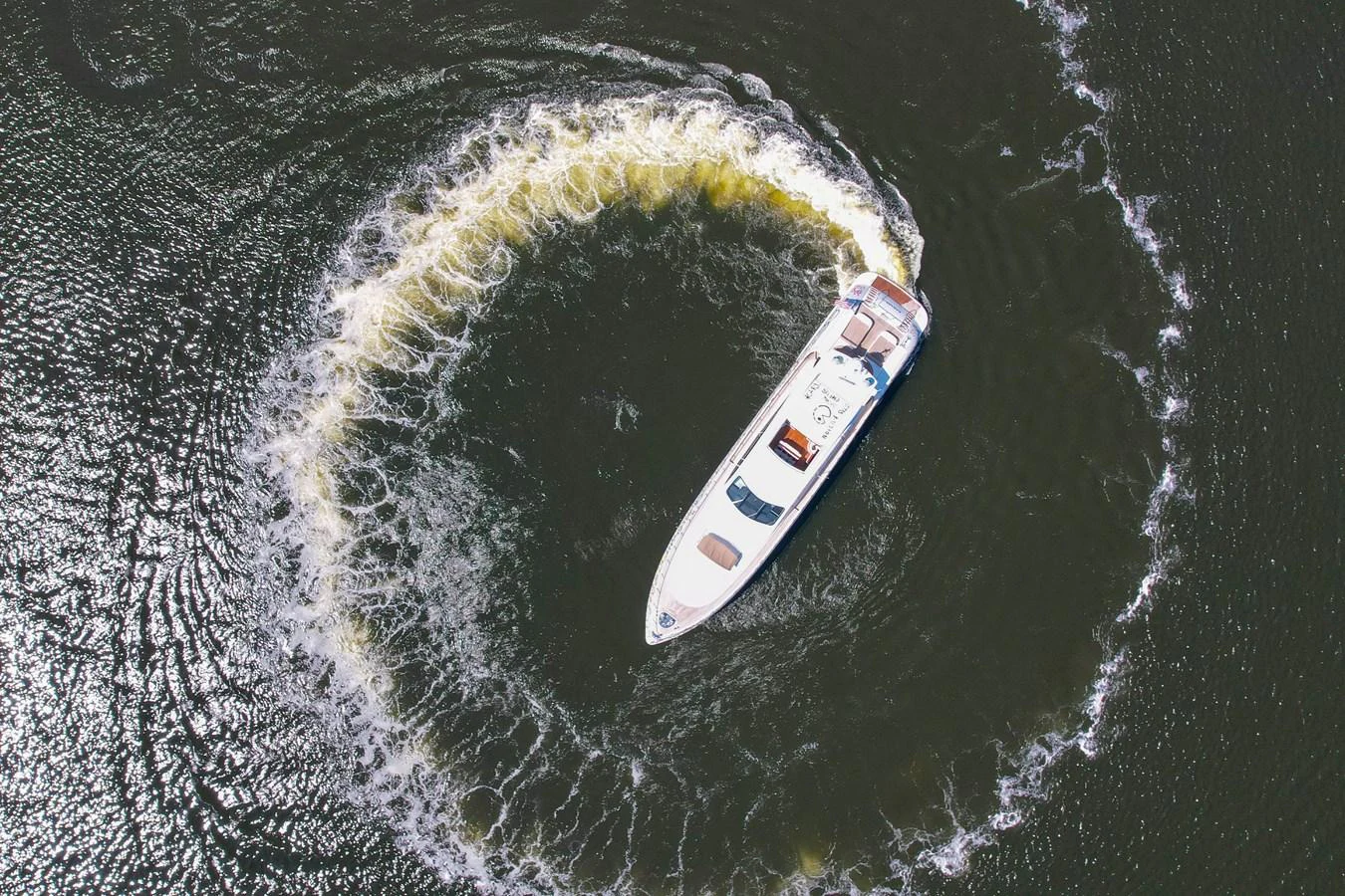 a white and yellow object in the water aboard 108' MANGUSTA 2002 Yacht for Sale