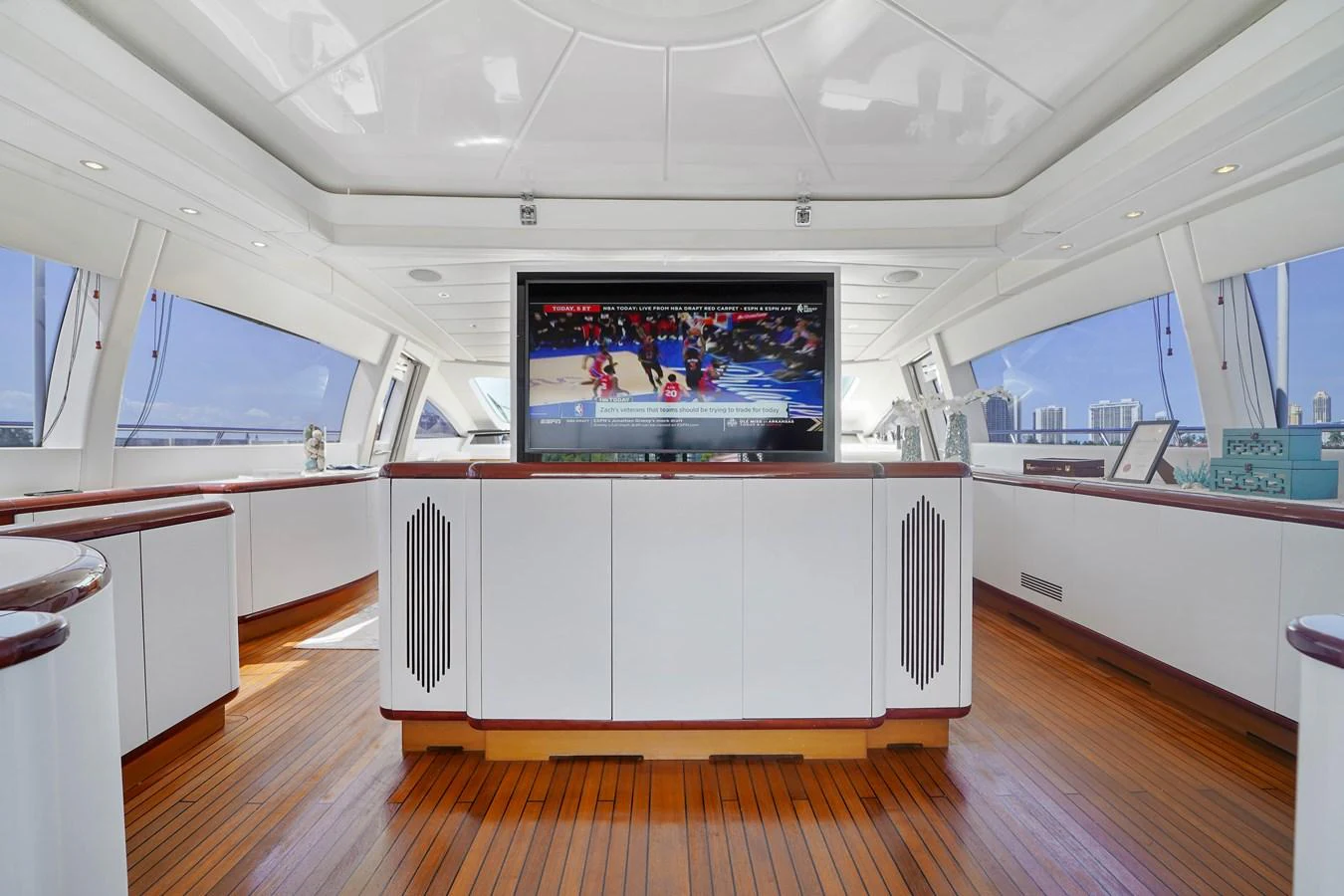 a room with a large tv aboard 108' MANGUSTA 2002 Yacht for Sale