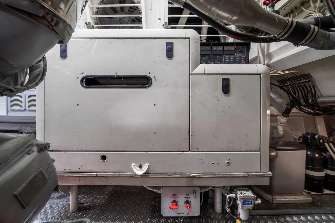 a large metal machine aboard 108' MANGUSTA 2002 Yacht for Sale