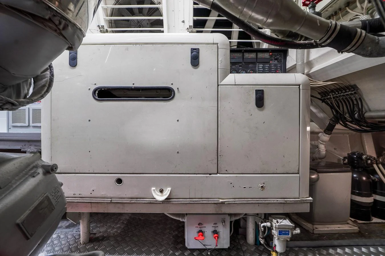 a large metal machine aboard 108' MANGUSTA 2002 Yacht for Sale