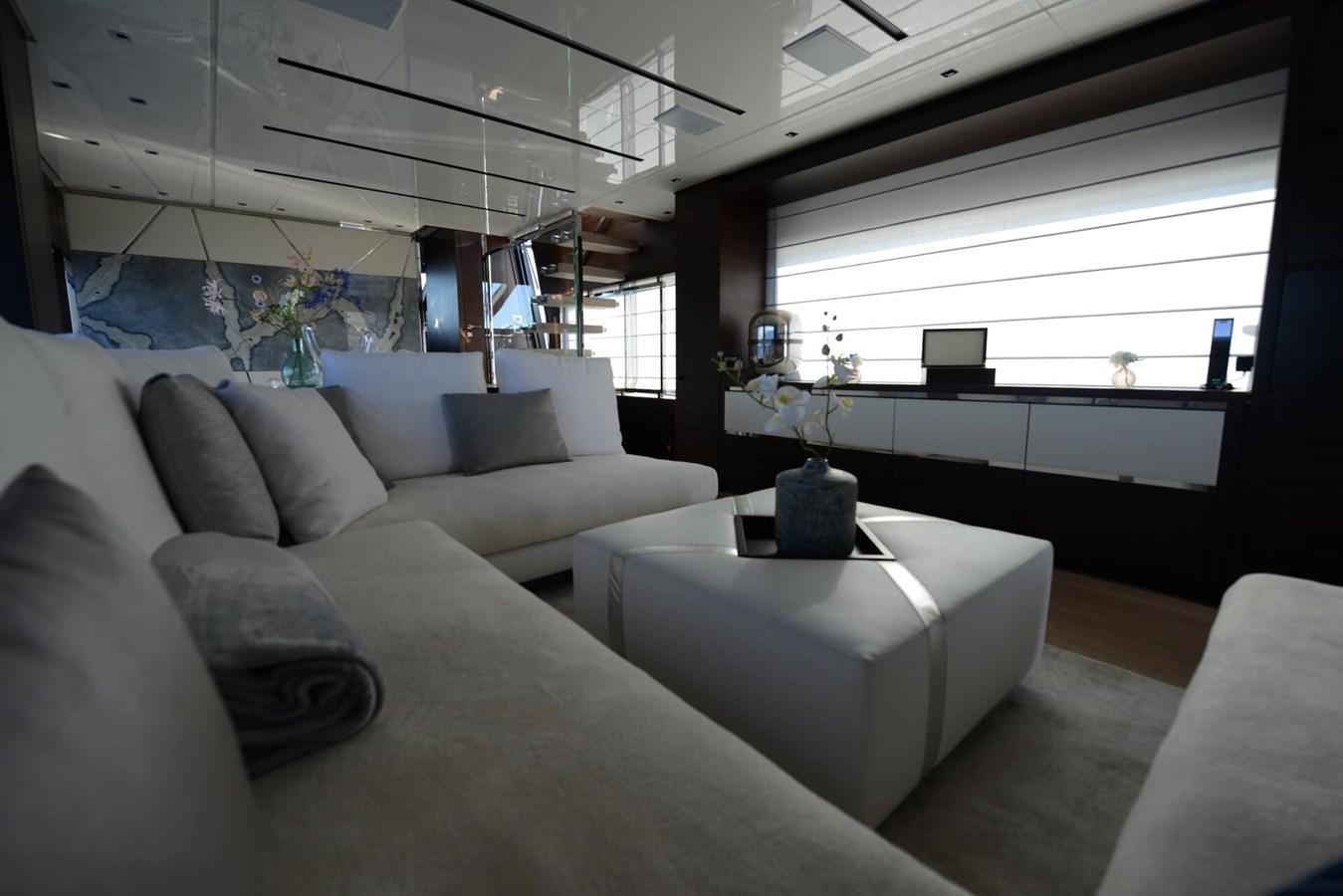 a living room with a couch and a table aboard ELLIE JAMES Yacht for Sale