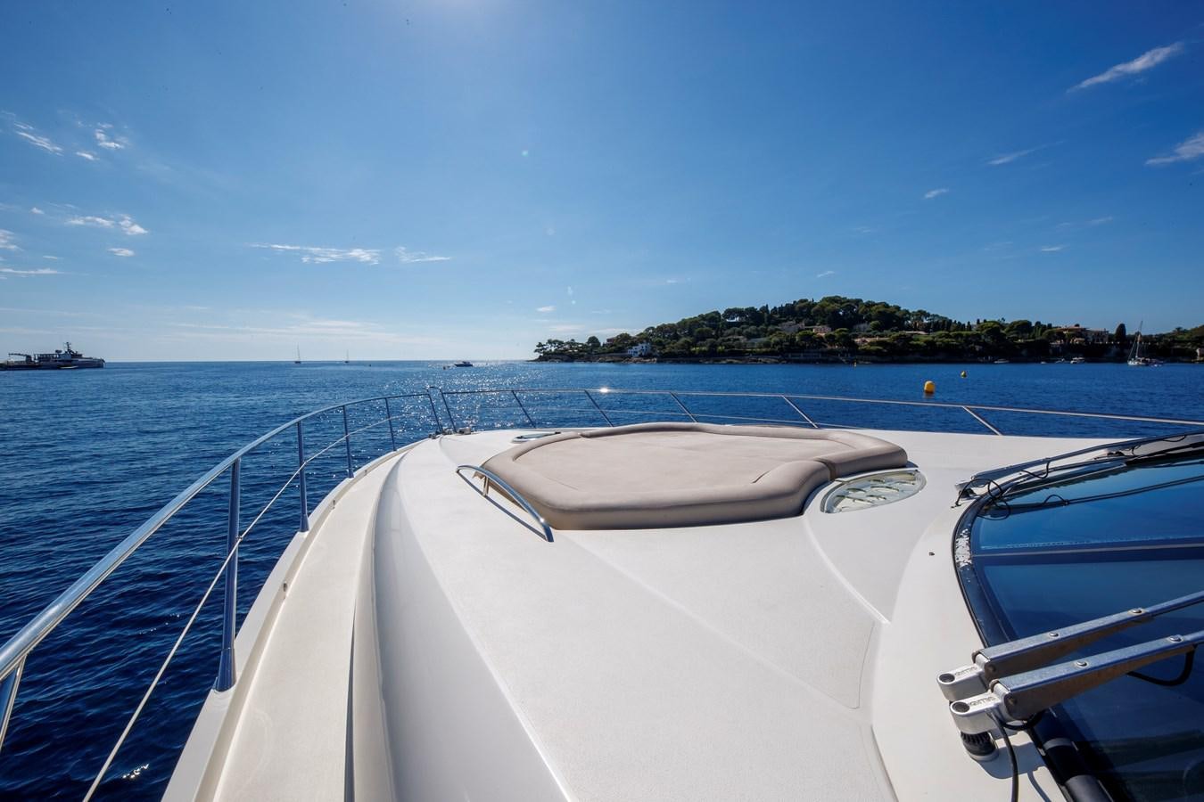 a boat on the water aboard NUTS Yacht for Sale