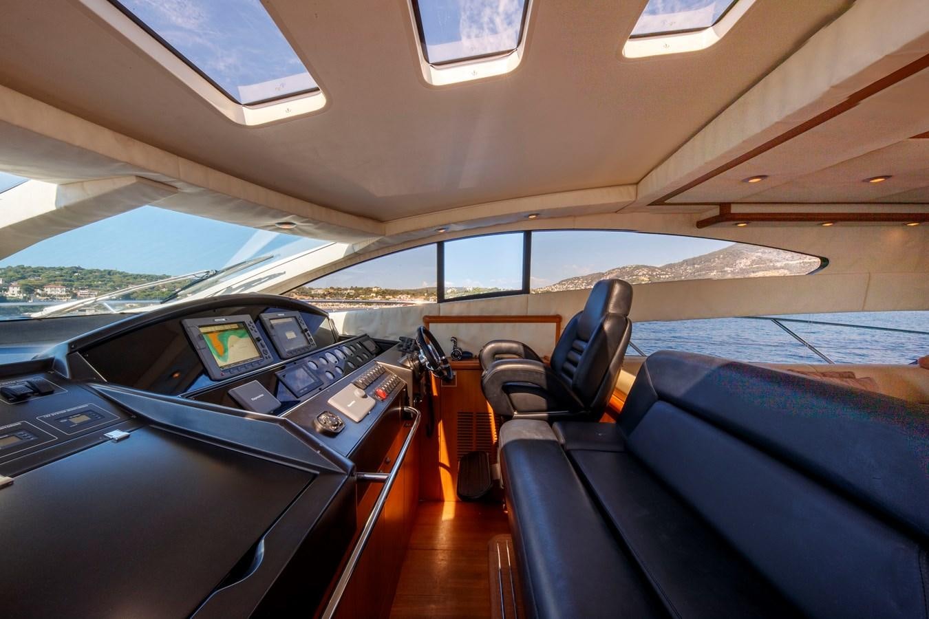inside of a car aboard NUTS Yacht for Sale