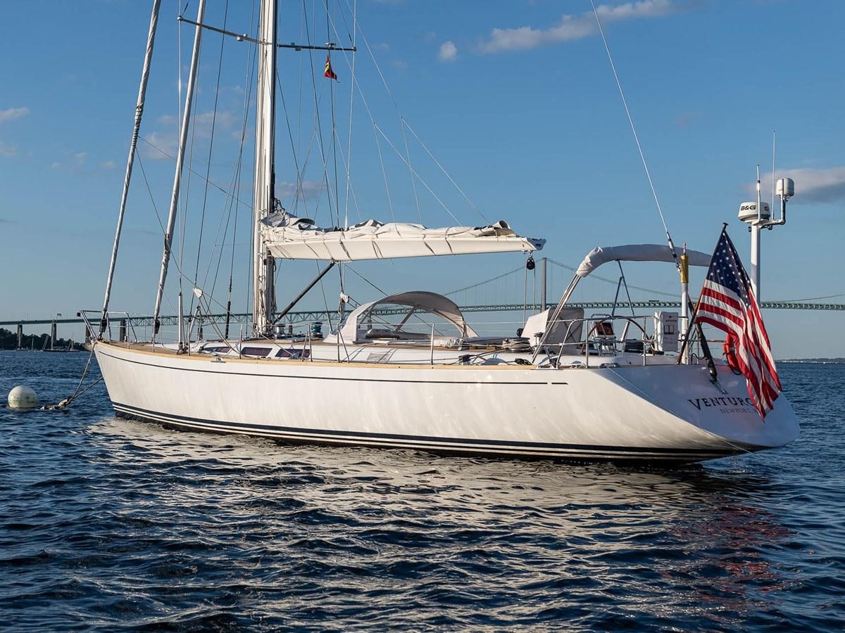 a large white boat in the water aboard VENTUROUS Yacht for Sale