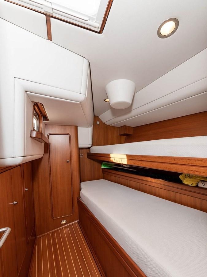 a wooden cabinet in a room aboard VENTUROUS Yacht for Sale