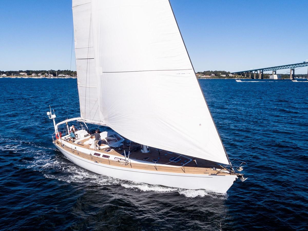 a white sailboat on the water aboard VENTUROUS Yacht for Sale