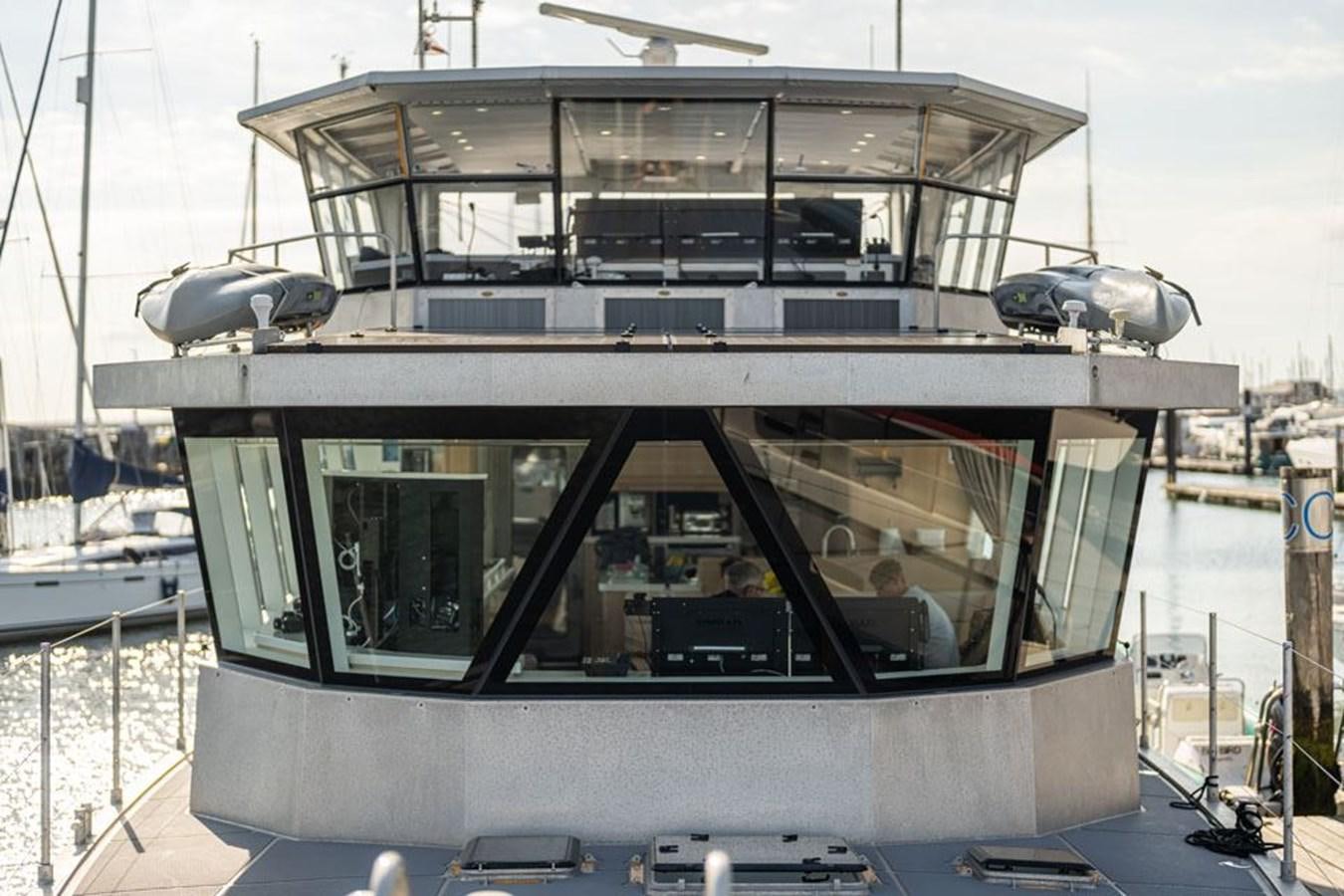 a boat with a glass front aboard GREY WOLF Yacht for Sale