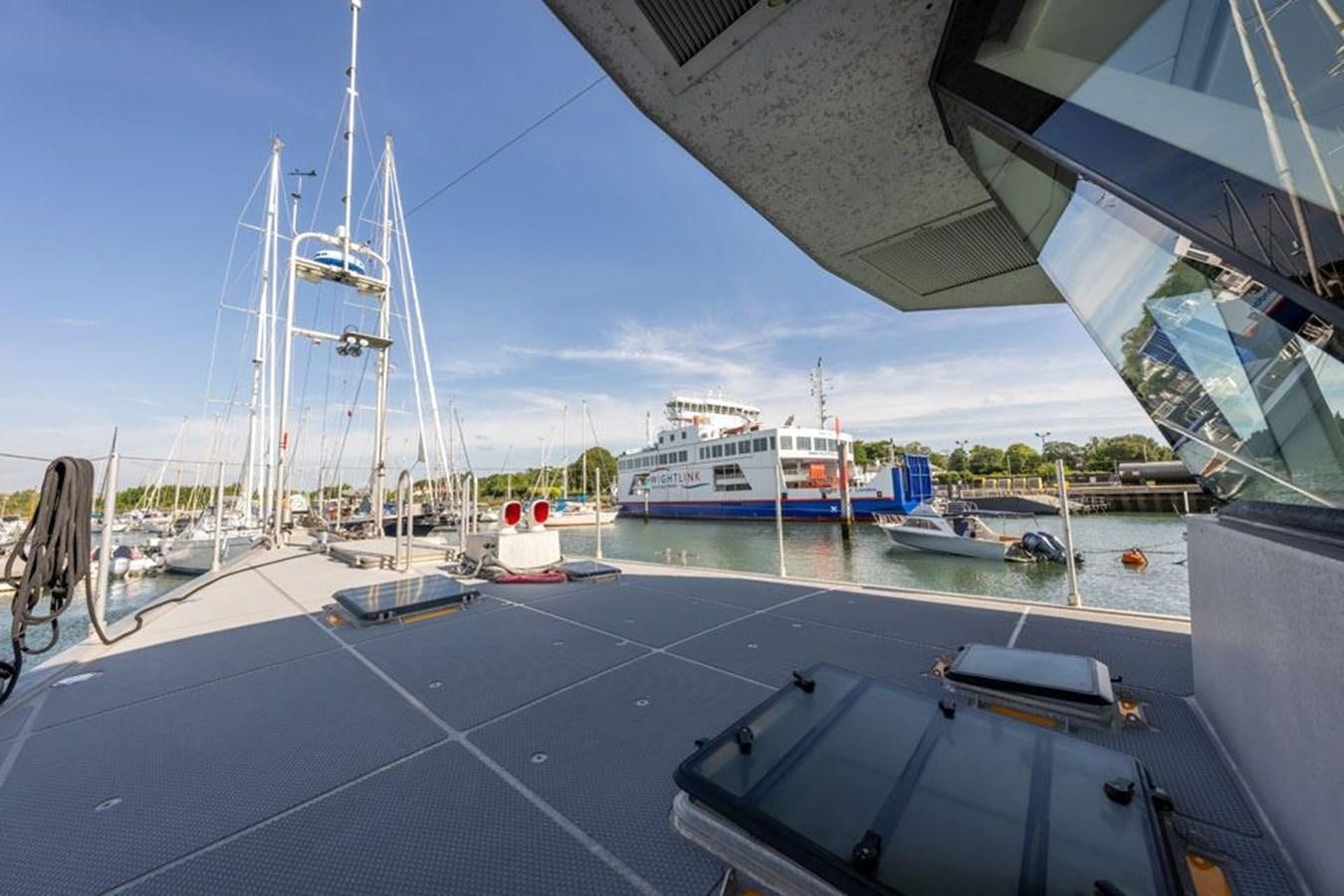 a boat is parked at a dock aboard GREY WOLF Yacht for Sale
