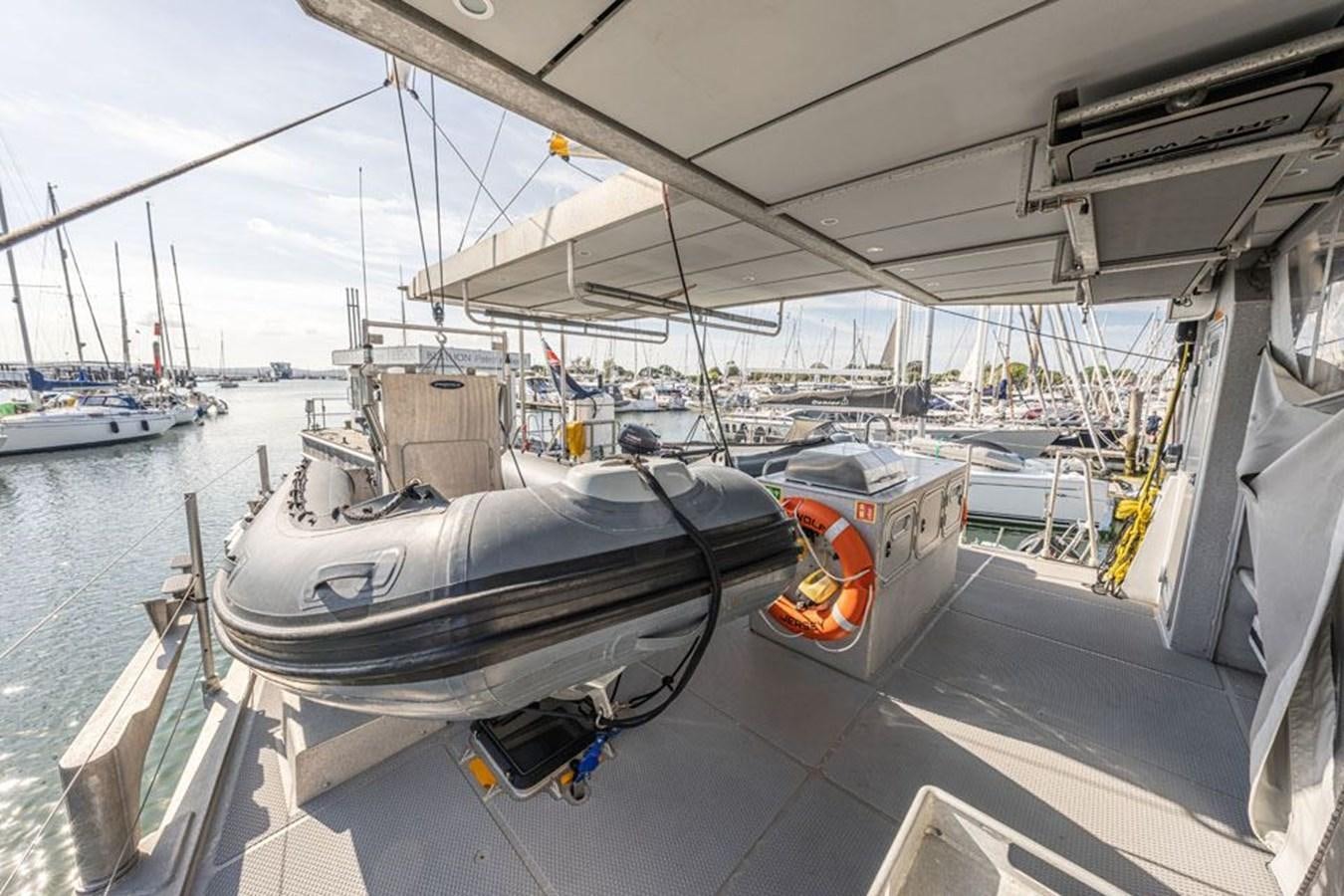 a boat docked at a pier aboard GREY WOLF Yacht for Sale